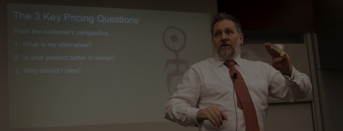 Tim J. Smith speaking at a pricing summit